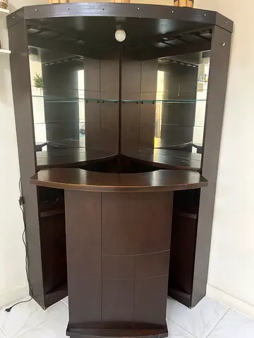 Modern Wooden Bar with Cabinets and Mirrored Back with glass holders