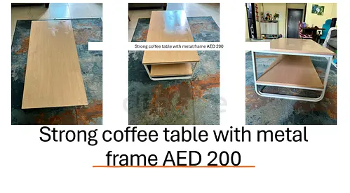 Used rectangular coffee table with metal frame - AED 200