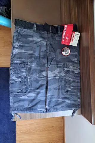 Size Waist 36. Unionbay Cordova 15 inch inseam Length Cargo Short. Original Brand New. Camo Black.