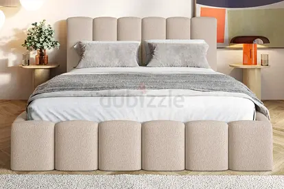 Beige Upholstered King Bed with Padded Headboard and Footboard