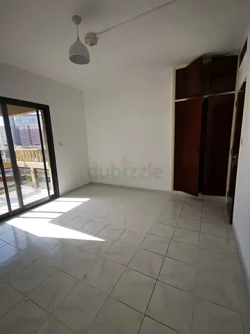 Private Room with Attached Balcony | Near Al Rigga Metro | Fully Furnished