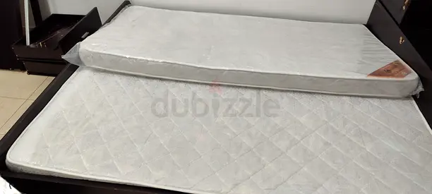 Single 2  Mattress (New/Unused) with Protective Cover