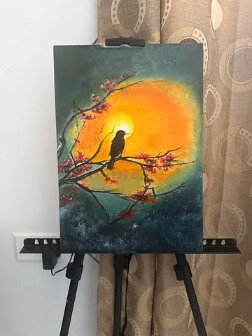 Original oil painting of bird on branch at sunset