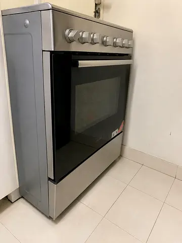 Used freestanding electric glass-top cooker with oven - good working condition