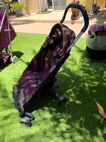 Lightweight purple umbrella stroller - compact and foldable