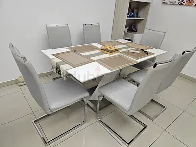 White Modern 6-Seater Dining Table with Chrome Frame Chairs
