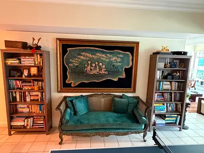 Vintage carved wooden sofa with teal upholstery (settee)