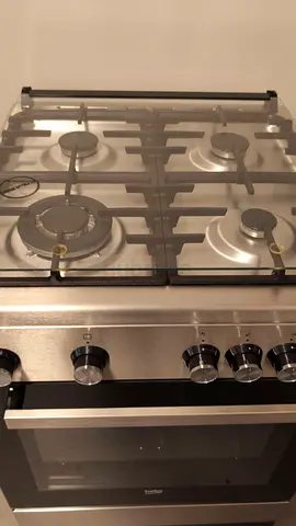 Beko Stainless steel 4-burner gas cooker with oven - good condition