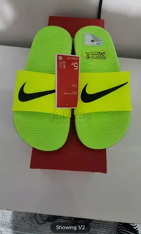 New original Nike slides size 37.5 for Aed 155
