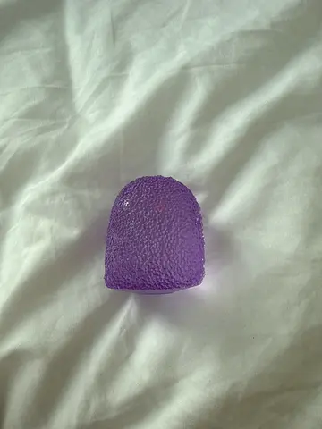 Small purple textured squishy sensory toy