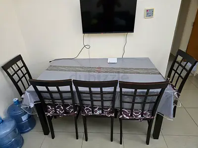 Dining table with 6 chairs - dark wood, good condition