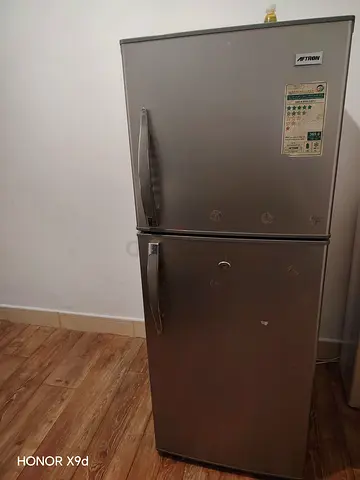 2 Door Silver Metron Top-Freezer Refrigerator - Good Working Condition available on urgent sale.