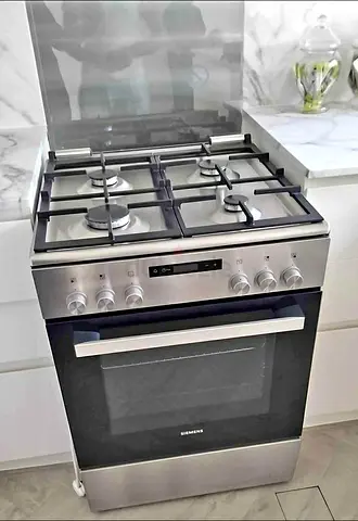 Siemens latest model Top gas oven electric cooker for sell 60by60cm good working