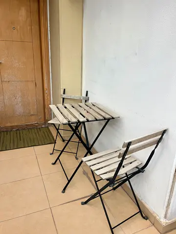 Set of 2 folding bistro chairs - white slatted wood with black metal frame