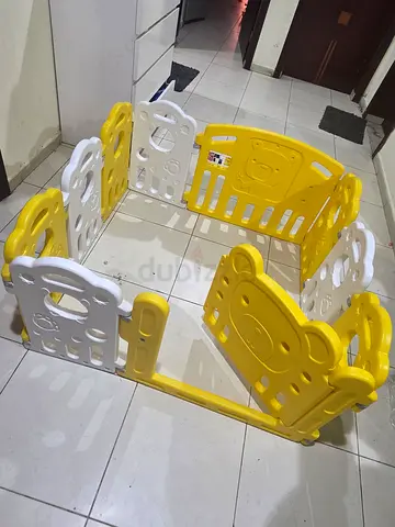 Yellow & white plastic baby playpen / activity play yard - good condition