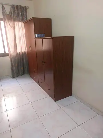 Room available for a bachelor to share with a Keralite near Karama Park