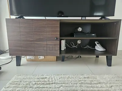 Dark wood TV cabinet with storage shelves and doors - good condition