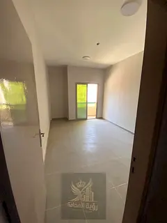 Two rooms and a hall for the first resident in Al Mamzar Al Taawun, with modern finishing, a distinc