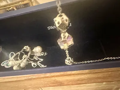 Silver charm necklace with Swarovski crystal charms — used