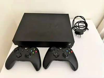 Xbox one x 1tb with controller and games
