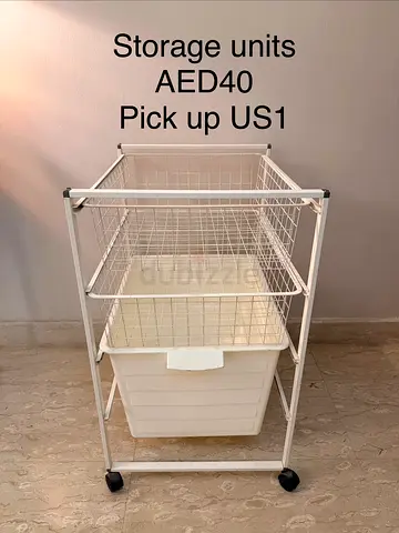 White rolling storage unit with baskets - AED 40