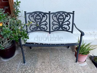 Outdoor cast iron decorative 2-seater bench with cushion