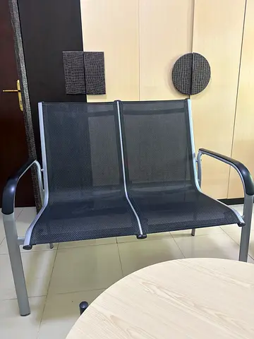 Two-seater metal frame mesh waiting bench — good condition