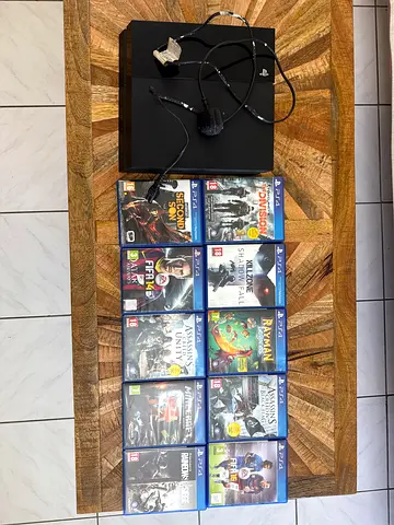 Sony PS4 original with 10 Games and Accessories - Good Condition
