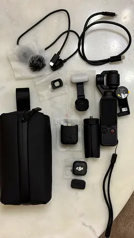 DJI Osmo Pocket 4 Creator Combo - Used Once