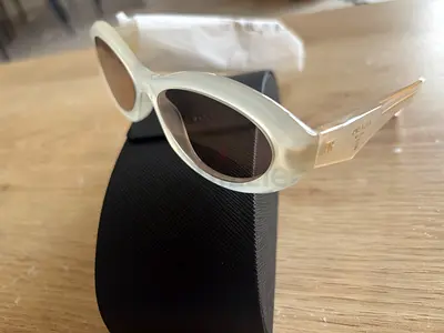 Brand New White Oval Prada Sunglasses for sale