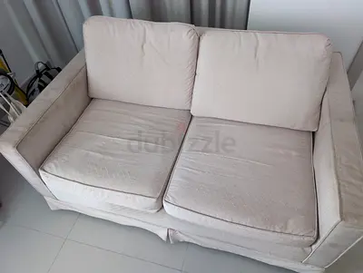 Beige 2-Seater Sofa - needs reupholster