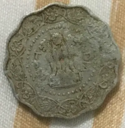 A 10 paisa coin from 1974 of India