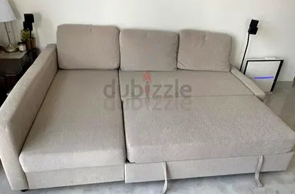 Light beige 3-seater sofa bed (convertible) in good condition