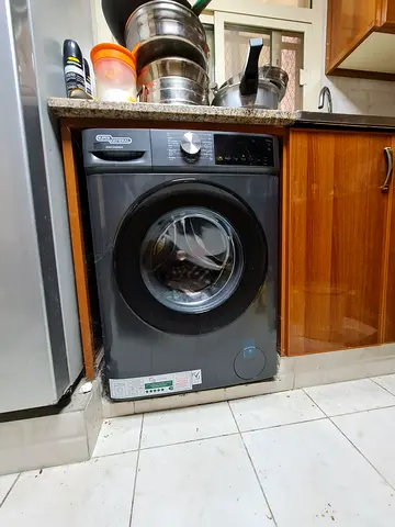10 kg, latest inverter type washing machine in excellent condition, with warranty.