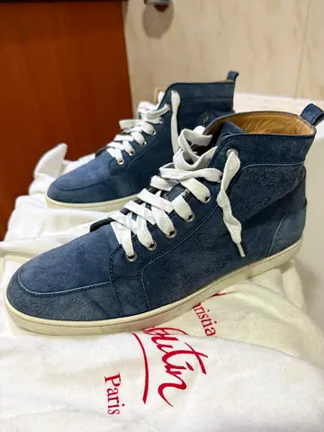 Authentic Louboutin rantinos flat veau velours. Turquin colour (Light Blue). Size 42. Boxed