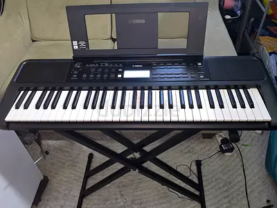 Yamaha PSR-E383 electronic keyboard with stand and chair - good working condition