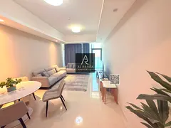 Rooms and a lounge in Gulf Tower with a swimming pool, gym, and two free parking spaces.