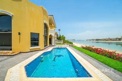 Exclusive Beachfront Villa with Skyline Views.