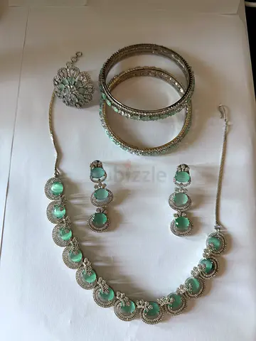 Silver-tone green stone necklace, earrings, bangles and ring set - good condition