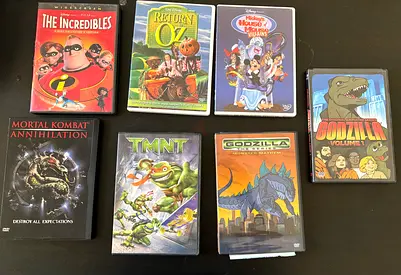 Lot of 7 DVDs — The Incredibles, Return to Oz, TMNT, Godzilla  more (used)
