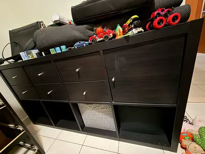 Ikea Kallax shelving unit with drawers and cupboards
