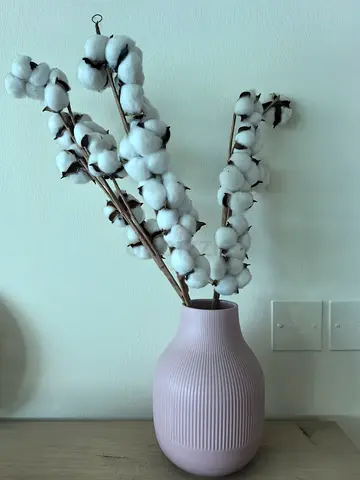 IKEA pink vase with artificial cotton stems in