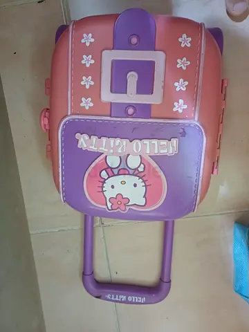 Hello kitty trolley bag with dolls and accessories
