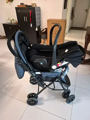 Used infant car seat with stroller frame - one set