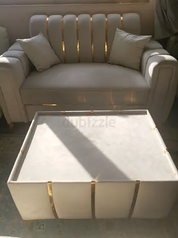 2 seater sofa with  cushions and table