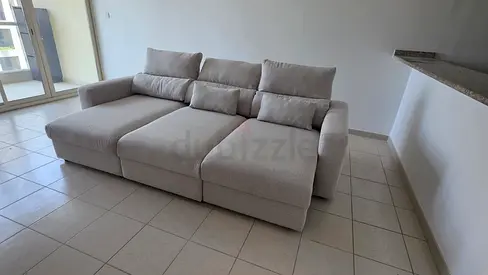 Ikea Eskilstuna L shape sofa under storage