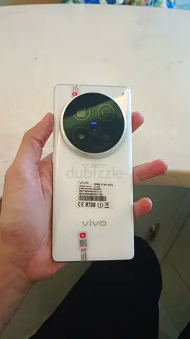 Vivo X100 Ultra smartphone (white) with circular rear camera module - good condition