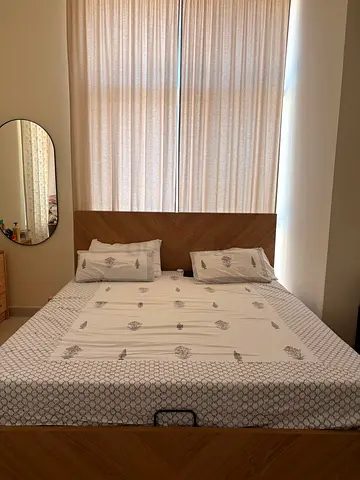 King bed with mattress and storage