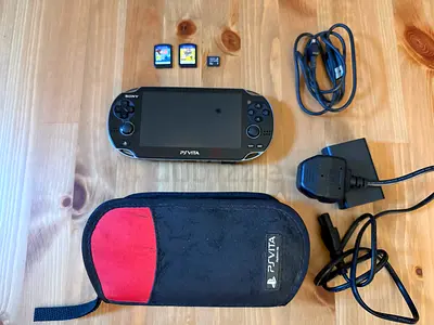 PS Vita with 2 Games
