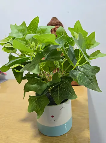 Planter with artificial plants for sale